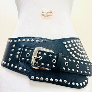 Black and silver studded leather belt with a punk, goth, and rave vibe